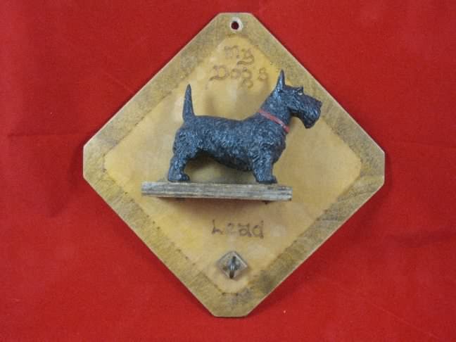 Dog leash hook plaque